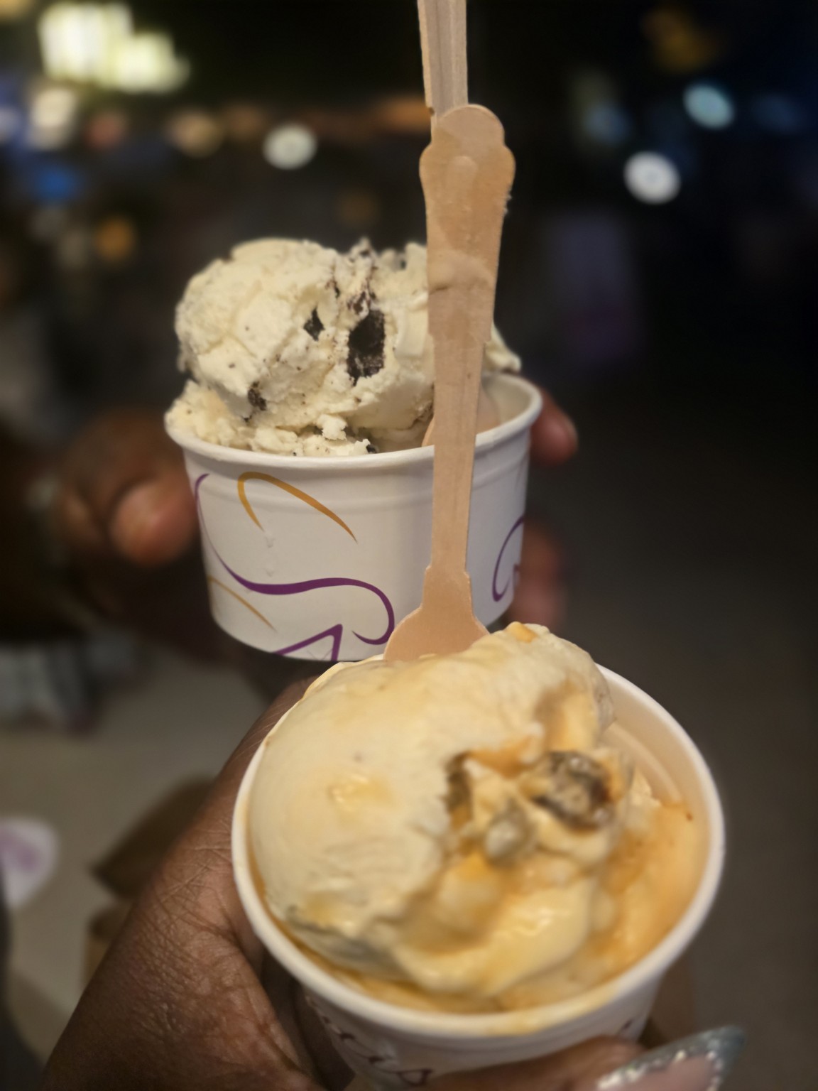 Two cups of gelato on a night out in Aruba